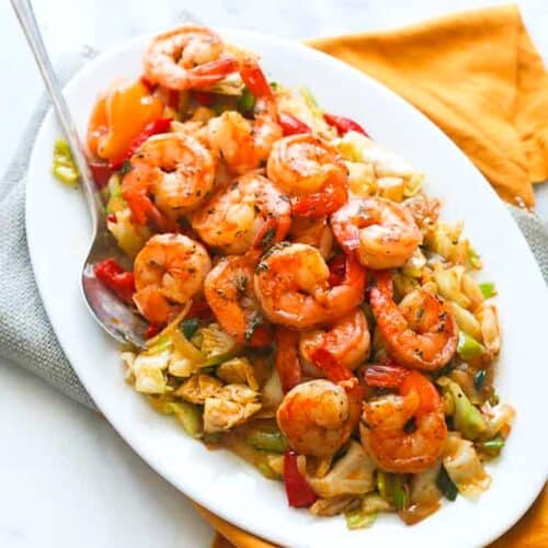 Serving up Jamaican cabbage and shrimp for a delicious and healthy weeknight dinner.