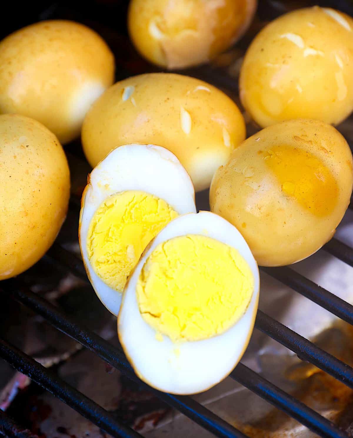 Slicing into an egg still in the smoker.
