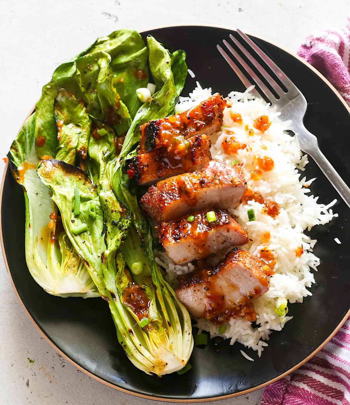 Serving freshly grilled bok choy with grilled pork belly and jasmine rice.
