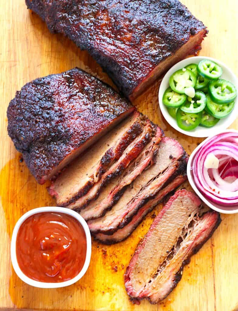 Enjoying the fruits of my labor by smoking beef brisket on a pellet grill.