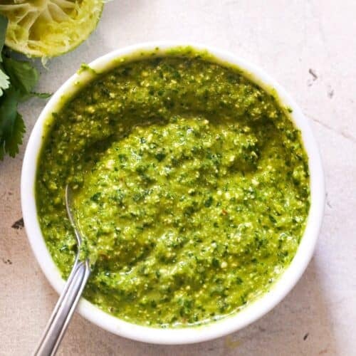 Spooning up some spicy Peruvian-style green sauce that's popular in the States.