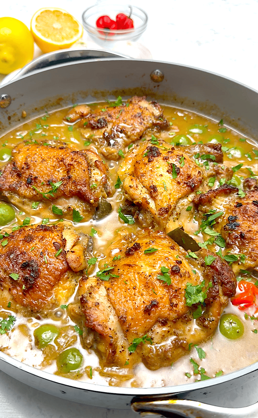 Chicken simmered in an onion, mustard, and lemon sauce for a Senegalese specialty.