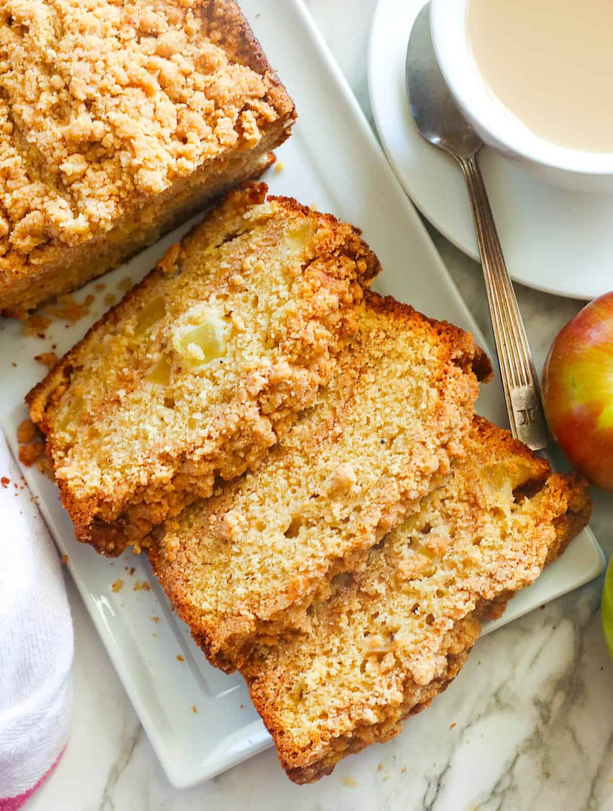 Slicing up fresh bread with soulful fall flavors for the holidays. The cup of coffee is optional but highly recommended.