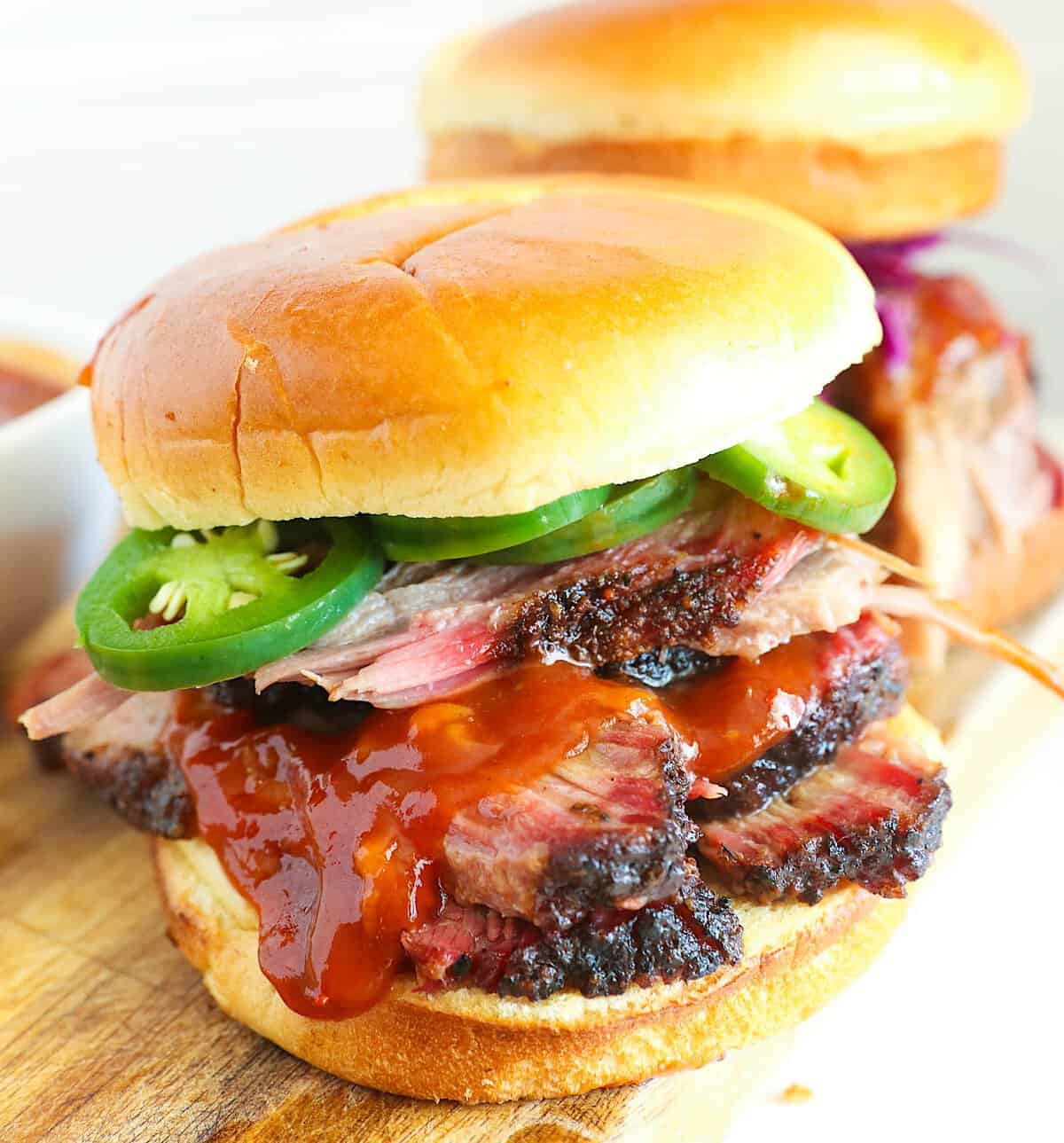 A freshly assembled sandwich made with beef brisket for a delicious way to use leftovers.