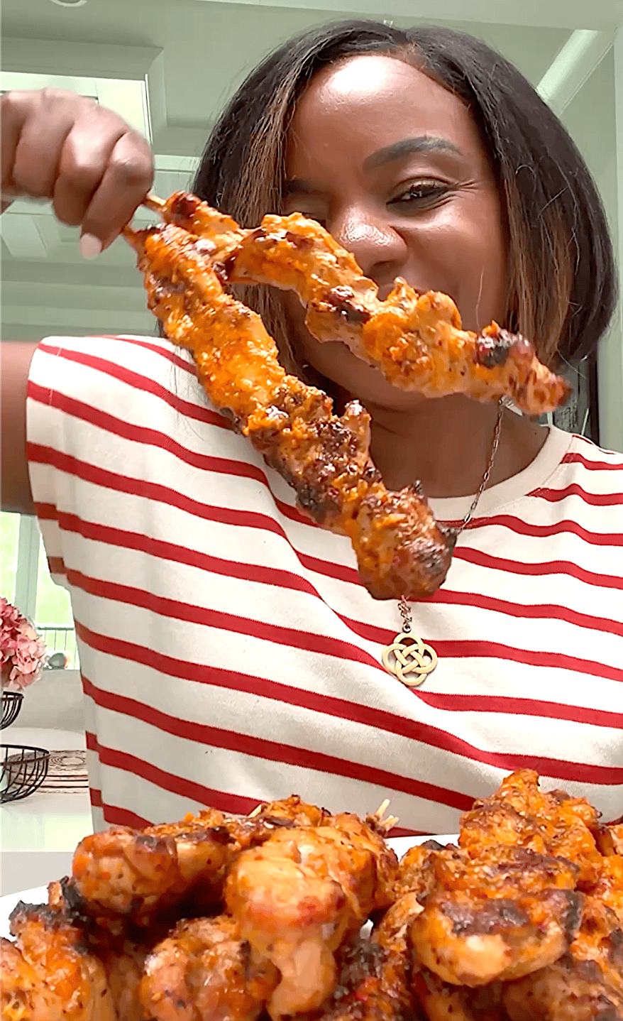 Imma getting ready to enjoy grilled chicken that was marinated in her favorite peri peri sauce.