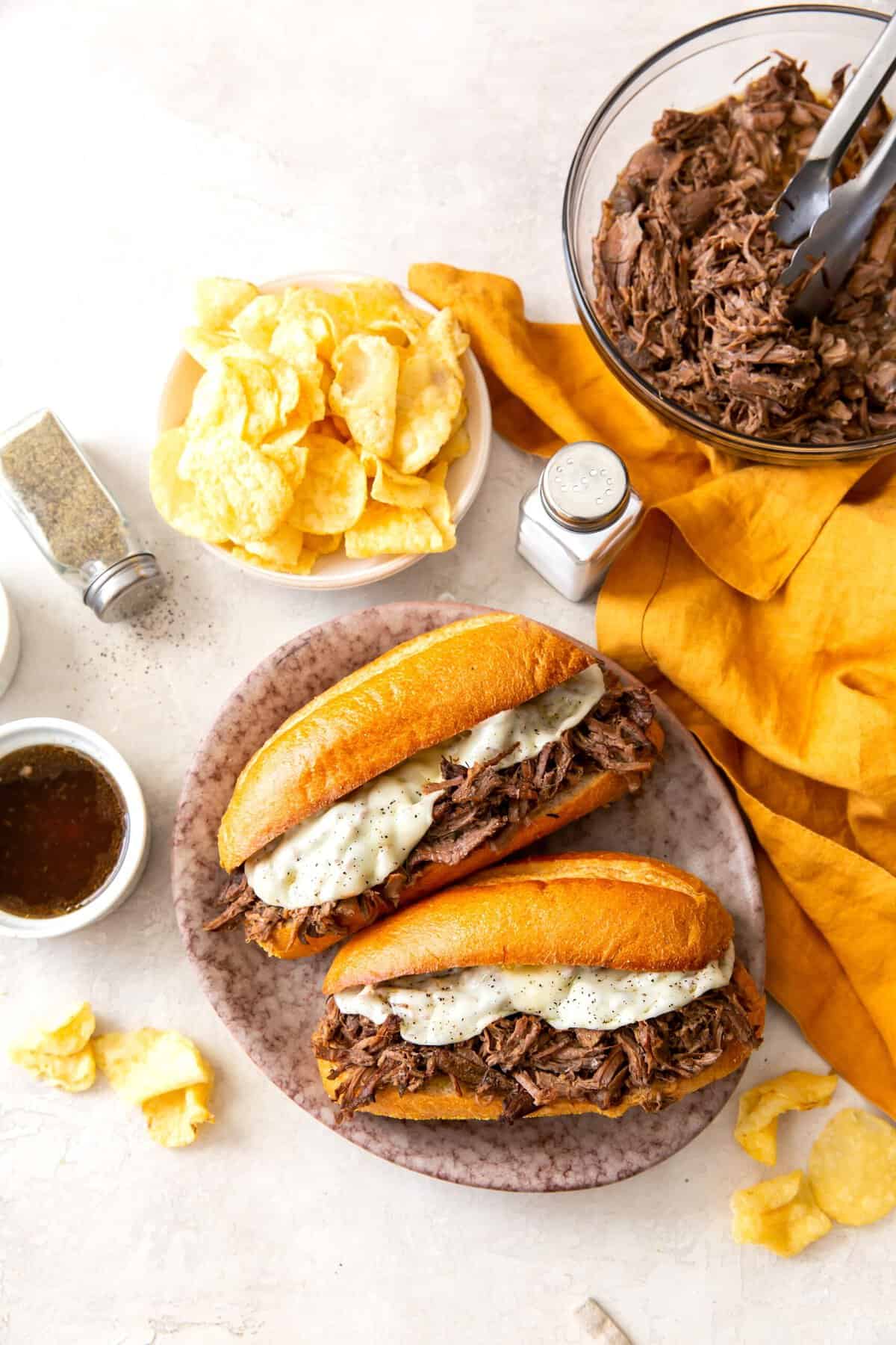 Enjoying a French dip sandwich made easier in a slow cooker.
