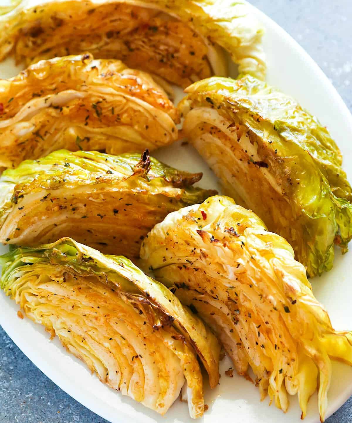 Smoking cabbage gives you a perfectly caramelized and delicious side dish.