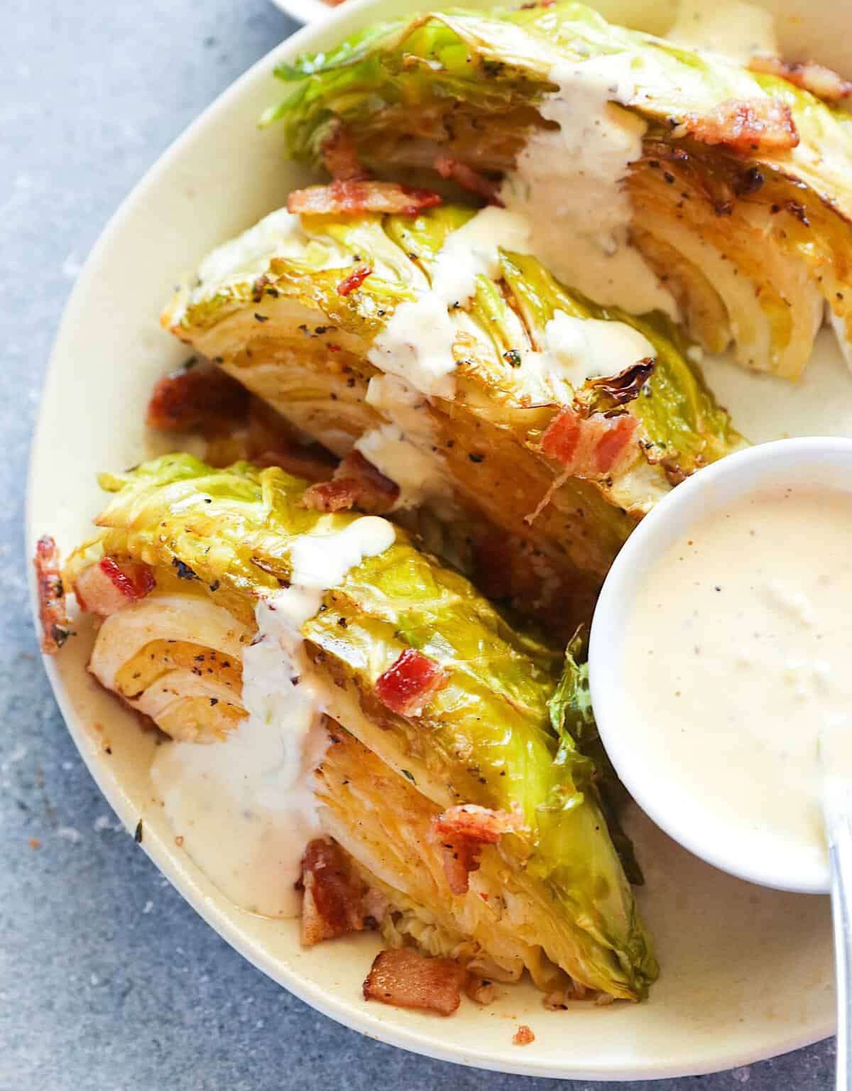 Serving up smoked cabbage with bacon and homemade remoulade sauce.