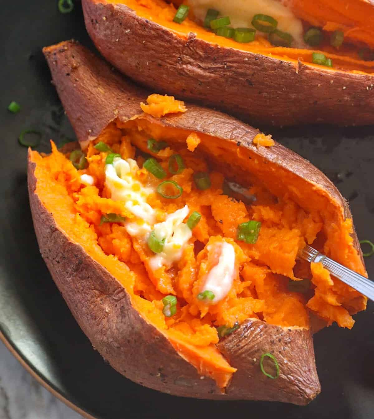 Diving into a hot sweet potato fresh from the smoker.