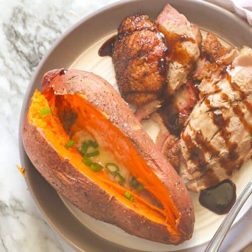 Serving up sweet potatoes fresh from the smoker with pellet grilled pork.