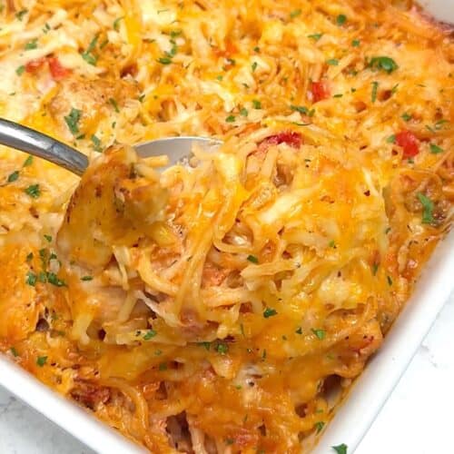 Baked chicken spaghetti fresh from the oven ready to satisfy a happy family.