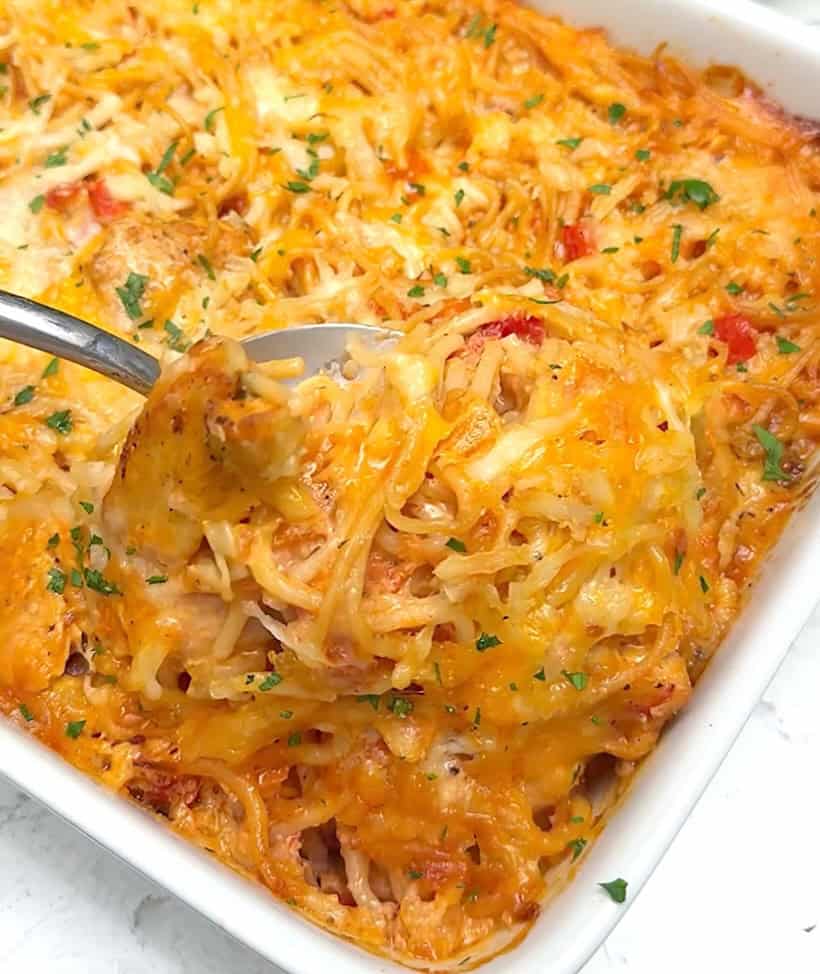 Baked chicken spaghetti fresh from the oven ready to satisfy a happy family.