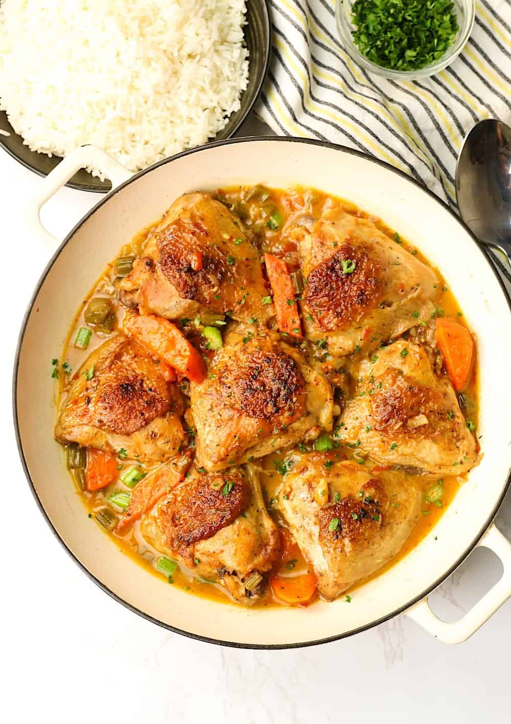 Serving up braised chicken thighs with basmati rice for an incredibly delicious weeknight meal.