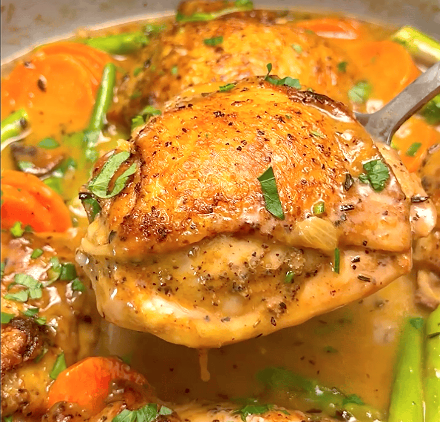 Showing off perfectly tender chicken fricassee made with thighs.