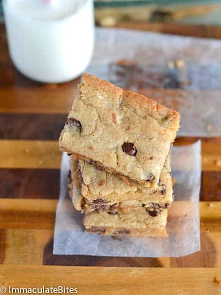 A stack of chocolate chip blondies ready to satisfy any sweet tooth.