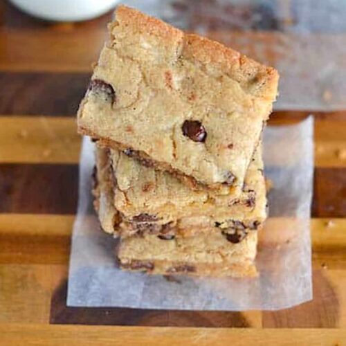 A stack of chocolate chip blondies ready to satisfy any sweet tooth.
