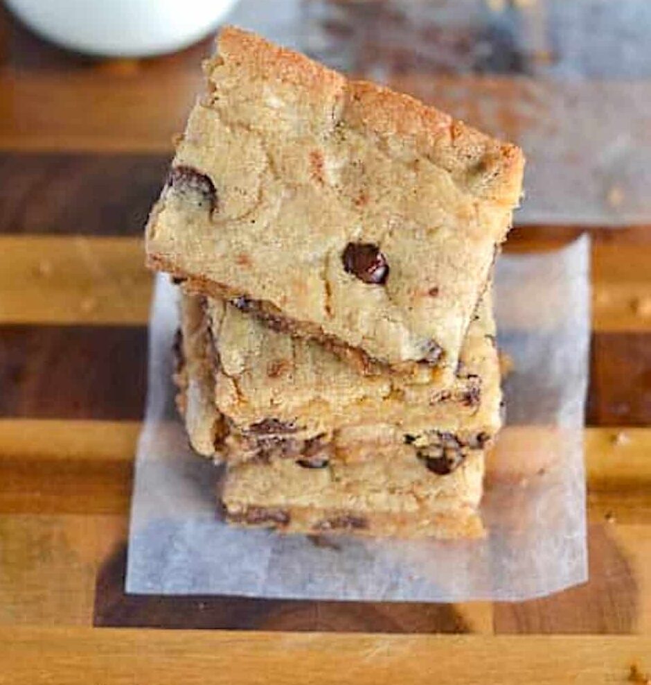 A stack of chocolate chip blondies ready to satisfy any sweet tooth.