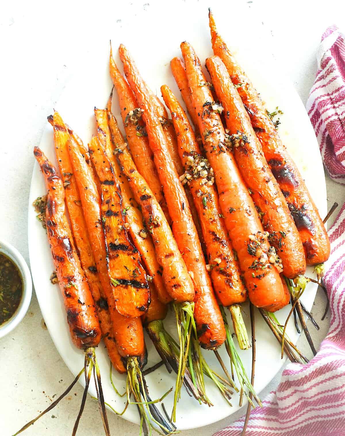 Serving up whole carrots made amazing on the grill. Brown butter with garlic and thyme take them over the top.