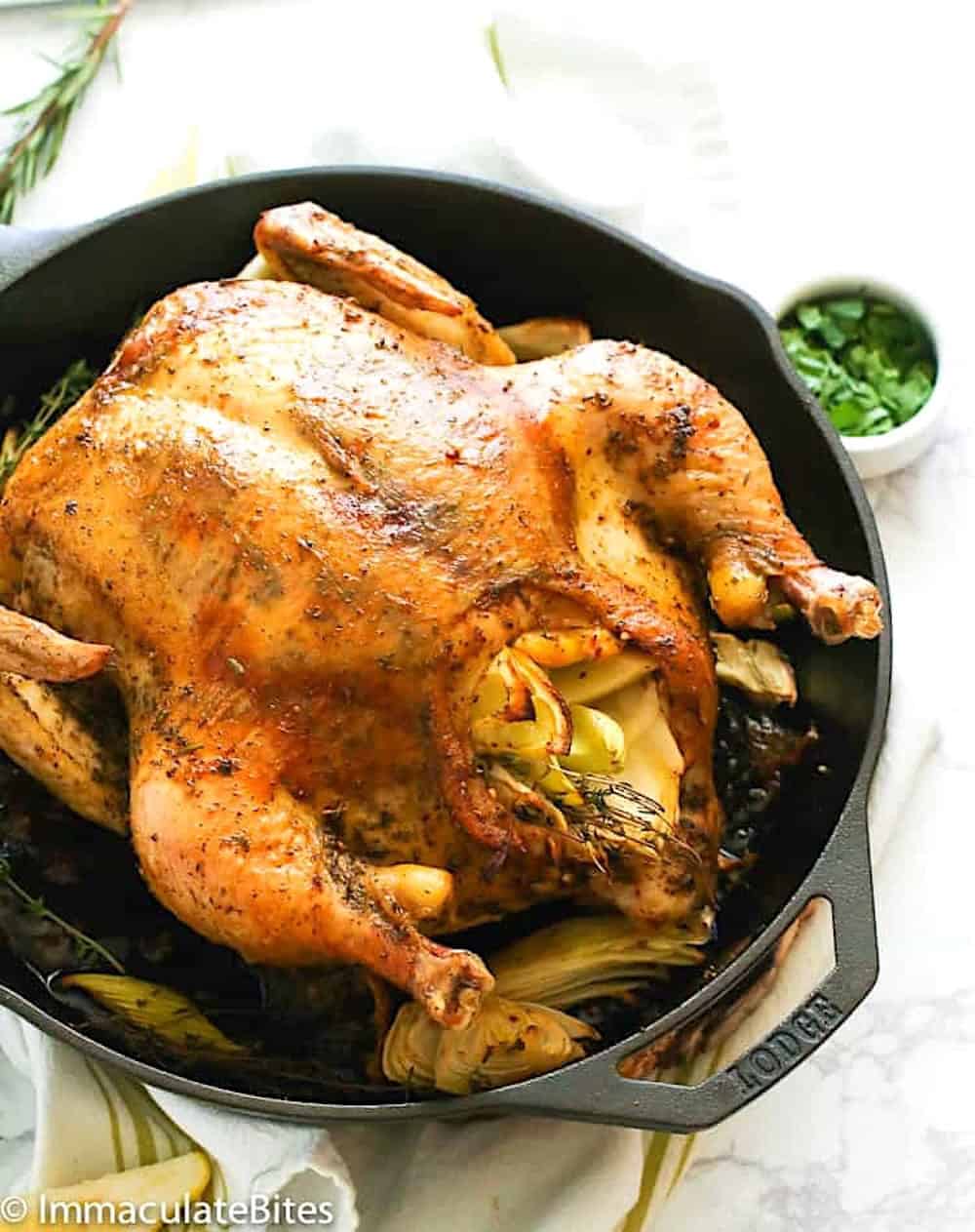A beautifully roasted chicken seasoned with poultry seasoning perfect for the occasion.