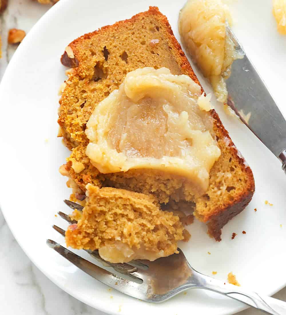Slathering a slice of banana bread with spiced butter. Pumpkin delivers delicious fall vibes.
