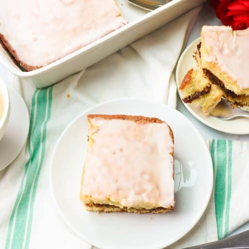 Serving up a slice of freshly baked honey bun cake for a sweet treat.