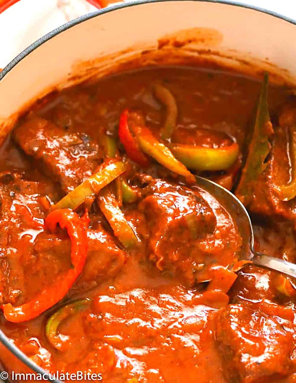 Umami loaded steak in a thick red sauce. Swissing makes it more tender.