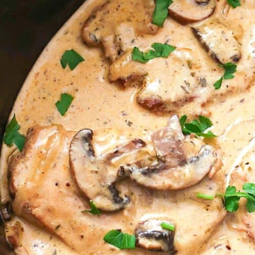 Slow cooker pork chops in a creamy mushroom gravy delivers Southern comfort food for the soul.