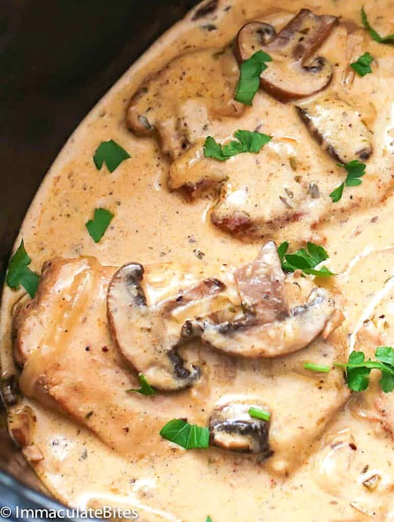 Slow cooker pork chops in a creamy mushroom gravy delivers Southern comfort food for the soul.