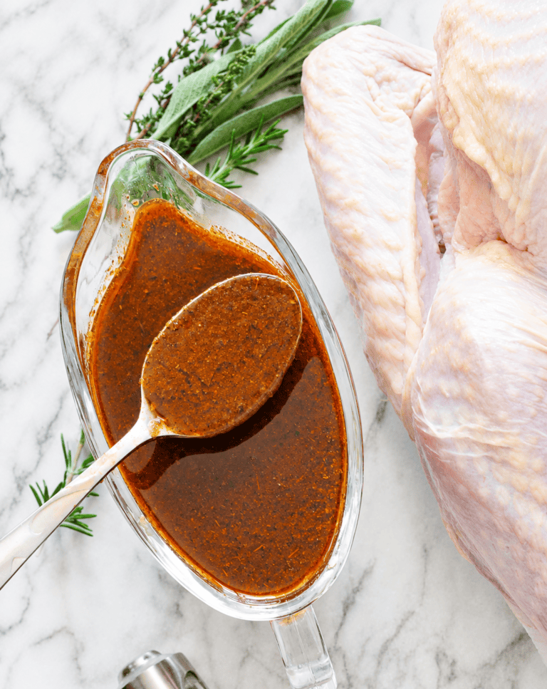 Getting ready to load the syringe for easy turkey injector marinade and a flavorful Thanksgiving.