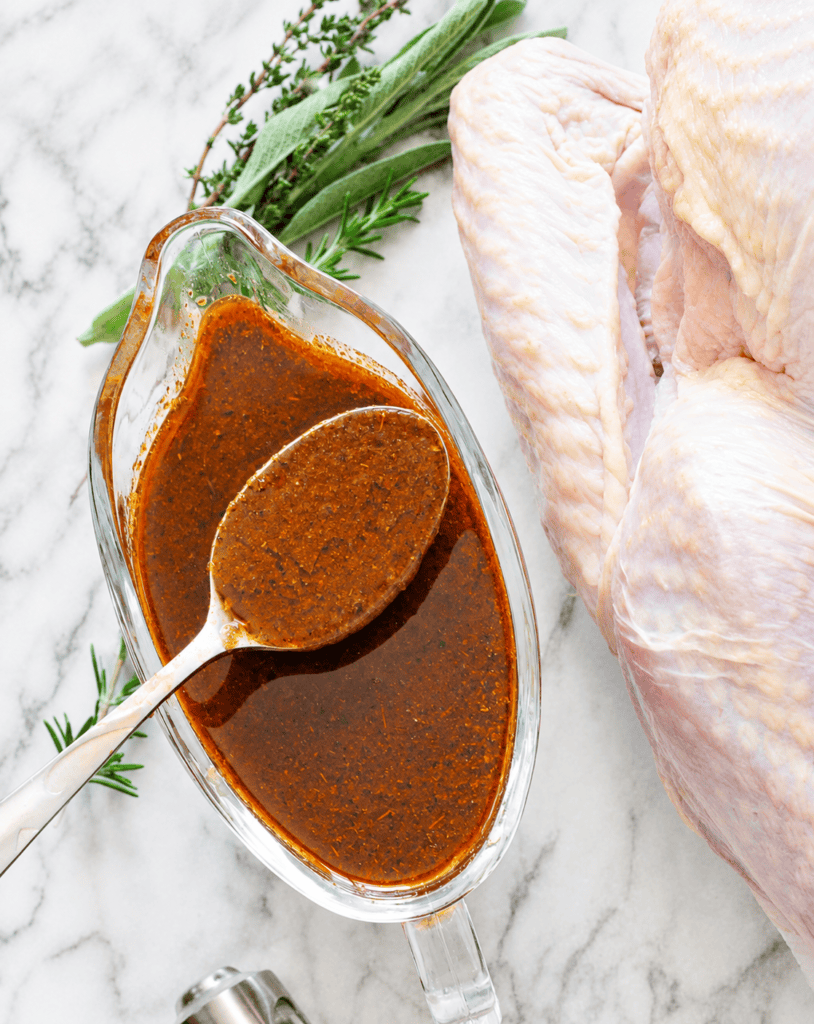 Getting ready to load the syringe for easy turkey injector marinade and a flavorful Thanksgiving.